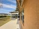 Back of house, showing patio and landscaping at 4098 Sw 51 St, Ocala, FL 34474