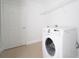 Laundry room with washer, dryer, and shelving at 4098 Sw 51 St, Ocala, FL 34474