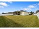 Large backyard with fenced perimeter and expansive lawn at 4314 Sw 65Th Pl, Ocala, FL 34474