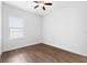 Spacious bedroom with hardwood floors and window at 4314 Sw 65Th Pl, Ocala, FL 34474