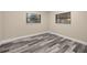 Well-lit bedroom featuring new flooring and neutral walls at 4377 Ne 13Th St, Ocala, FL 34470