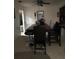 Dining room with a dark wood table and matching chairs at 4434 Se 10Th Pl, Ocala, FL 34471