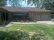 House exterior showcasing a welcoming front entrance and landscaping at 4434 Se 10Th Pl, Ocala, FL 34471