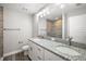 Bathroom with double vanity and granite countertop at 46 Locust Pass Run, Ocala, FL 34480