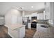 Modern kitchen with stainless steel appliances and granite countertops at 46 Locust Pass Run, Ocala, FL 34480