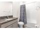 Bathroom with granite countertop and a shower/tub at 5325 Sunshine Dr, Wildwood, FL 34785