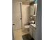 Small bathroom with white vanity and toilet at 533 Midway Dr # B, Ocala, FL 34472