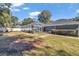 Home with fenced backyard, screened pool, and patio at 5579 Se 44Th Cir, Ocala, FL 34480