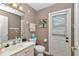 Clean bathroom with updated vanity and toilet at 5579 Se 44Th Cir, Ocala, FL 34480