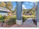 Brick walkway leading to a light blue house entryway at 5579 Se 44Th Cir, Ocala, FL 34480