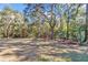 Community playground with swings, playset, and picnic tables at 5579 Se 44Th Cir, Ocala, FL 34480