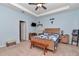 Serene bedroom featuring a comfy bed, wooden furniture, and a calming color scheme at 6158 Sw 88Th Loop, Ocala, FL 34476