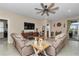 Relaxing living room with sectional sofa and fireplace at 6158 Sw 88Th Loop, Ocala, FL 34476