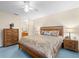 Main bedroom with en-suite bathroom and ample dresser space at 7994 Se 174Th Belhaven Loop, The Villages, FL 32162