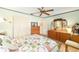 Bright bedroom with a comfy bed, built-in closet, and dresser at 8420 Sw 93 Ln # E, Ocala, FL 34481