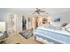 Main bedroom with a queen bed and large walk-in closet at 8420 Sw 93 Ln # E, Ocala, FL 34481