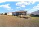 Home with screened porch and grassy backyard at 8761 Sw 79Th Loop, Ocala, FL 34481