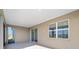 Covered screened patio with access to the interior of the home at 8761 Sw 79Th Loop, Ocala, FL 34481