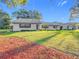 Ranch style home with mature trees and landscaped yard at 9050 Sw 190Th Cir, Dunnellon, FL 34432