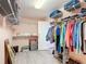 Large walk-in closet with wire shelving and ample hanging space at 9050 Sw 190Th Cir, Dunnellon, FL 34432