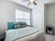 Bedroom with queen bed, ceiling fan and window coverings at 9474 Sw 52Nd Loop, Ocala, FL 34481