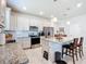 Modern kitchen with stainless steel appliances and granite island at 9474 Sw 52Nd Loop, Ocala, FL 34481