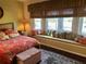 Bright bedroom with window seat and golf course view at 13300 Se 97Th Terrace Rd, Summerfield, FL 34491