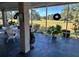 View from screened porch overlooking a lush green golf course at 13300 Se 97Th Terrace Rd, Summerfield, FL 34491