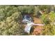 Aerial view of a house with a detached workshop at 13740 Sw 49Th Pl, Ocala, FL 34481
