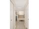 Clean bathroom with a bathtub, double vanity, and ample storage at 13740 Sw 49Th Pl, Ocala, FL 34481