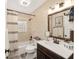 Updated bathroom with a modern vanity and shower/tub combo at 13740 Sw 49Th Pl, Ocala, FL 34481