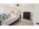 Spacious bedroom with a comfortable bed and ample closet space at 13740 Sw 49Th Pl, Ocala, FL 34481