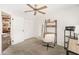 Bright home office features built-in shelving and a comfortable workspace at 13740 Sw 49Th Pl, Ocala, FL 34481