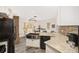 Modern kitchen with granite countertops and stainless steel appliances at 13740 Sw 49Th Pl, Ocala, FL 34481