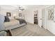Bright main bedroom with plush carpeting and an ensuite bathroom at 13740 Sw 49Th Pl, Ocala, FL 34481