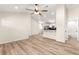 Open living room with wood-look floors and high ceiling at 14764 Sw 34Th St, Ocala, FL 34481