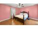 Large bedroom with a double bed and light wood floors at 15 Pine Run Ter, Ocala, FL 34472