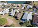 Aerial view of houses and a neighborhood street at 15440 Sw 14Th Avenue Rd, Ocala, FL 34473