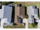 Aerial view of three homes with different colored roofs at 15440 Sw 14Th Avenue Rd, Ocala, FL 34473