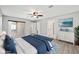 Spacious bedroom with large bed, white dresser and en-suite bathroom at 15692 Sw 11Th Court Rd, Ocala, FL 34473