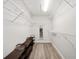 Large walk-in closet with shelving and rods at 15692 Sw 11Th Court Rd, Ocala, FL 34473