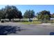 Community dog park with fenced area, benches, and shade trees at 15692 Sw 11Th Court Rd, Ocala, FL 34473