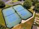 Two well-maintained tennis courts for recreational use at 15692 Sw 11Th Court Rd, Ocala, FL 34473