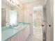Bathroom boasts a large vanity and walk-in shower at 1616 San Diego St, The Villages, FL 32159