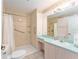 Clean bathroom with vanity and updated shower at 1616 San Diego St, The Villages, FL 32159
