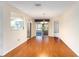 Spacious dining area with hardwood floors and a chandelier at 1616 San Diego St, The Villages, FL 32159