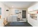 Laundry room with washer, dryer, cabinets, and utility sink at 1616 San Diego St, The Villages, FL 32159