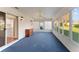 Sunroom with ample natural light and backyard view at 1616 San Diego St, The Villages, FL 32159