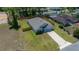 An aerial view of a home showcasing its fenced backyard and proximity to neighboring houses at 1664 Sw 167Th St, Ocala, FL 34473
