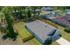 Aerial view of a single Gathering home and fenced in yard with green lawn at 1664 Sw 167Th St, Ocala, FL 34473